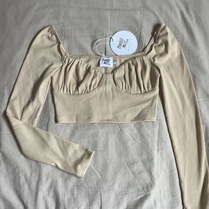 Never worn Princess Polly boutique long sleeve crop top tags attached! Size 6